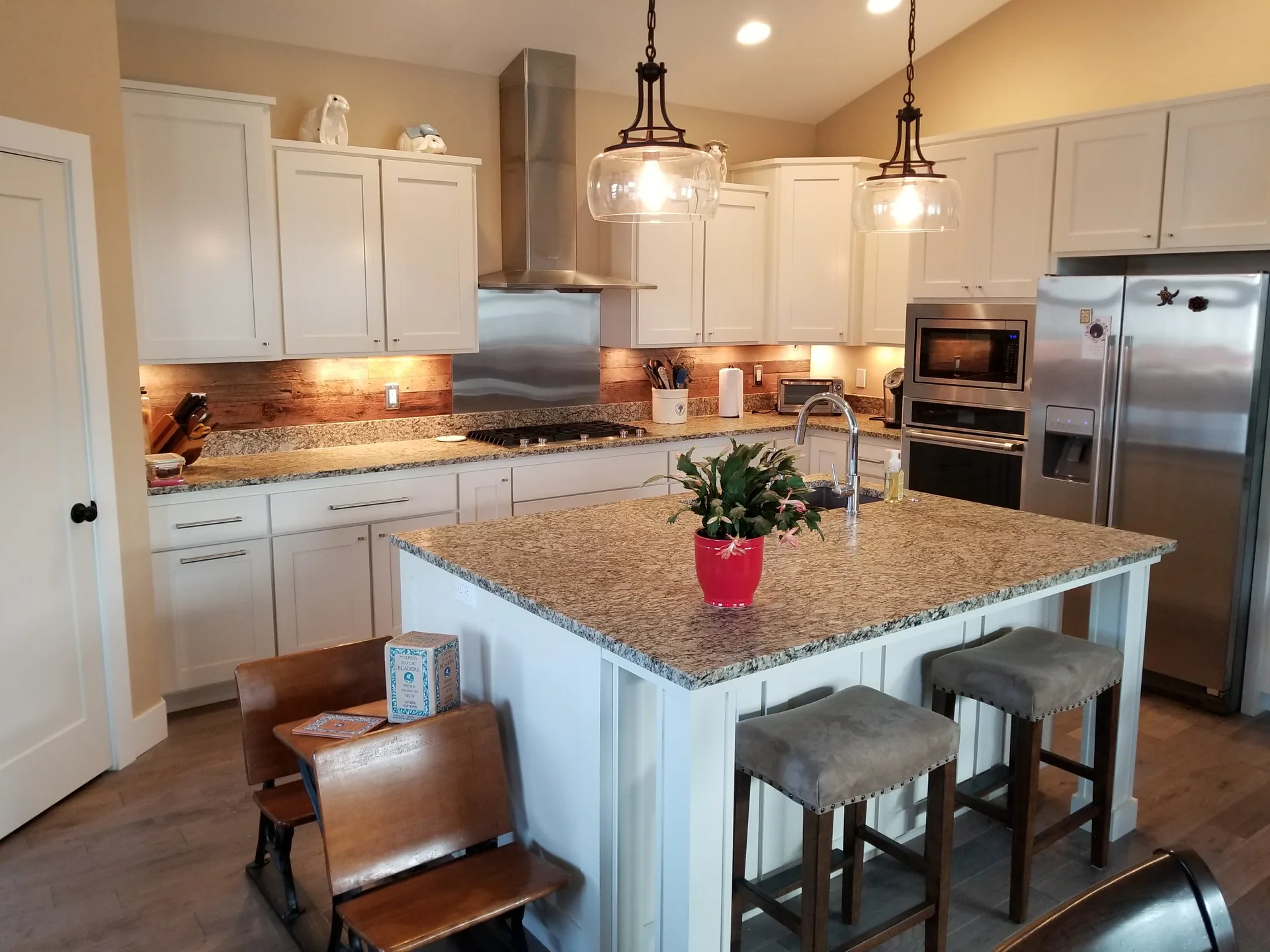 Gold granite island in traditional kitchen