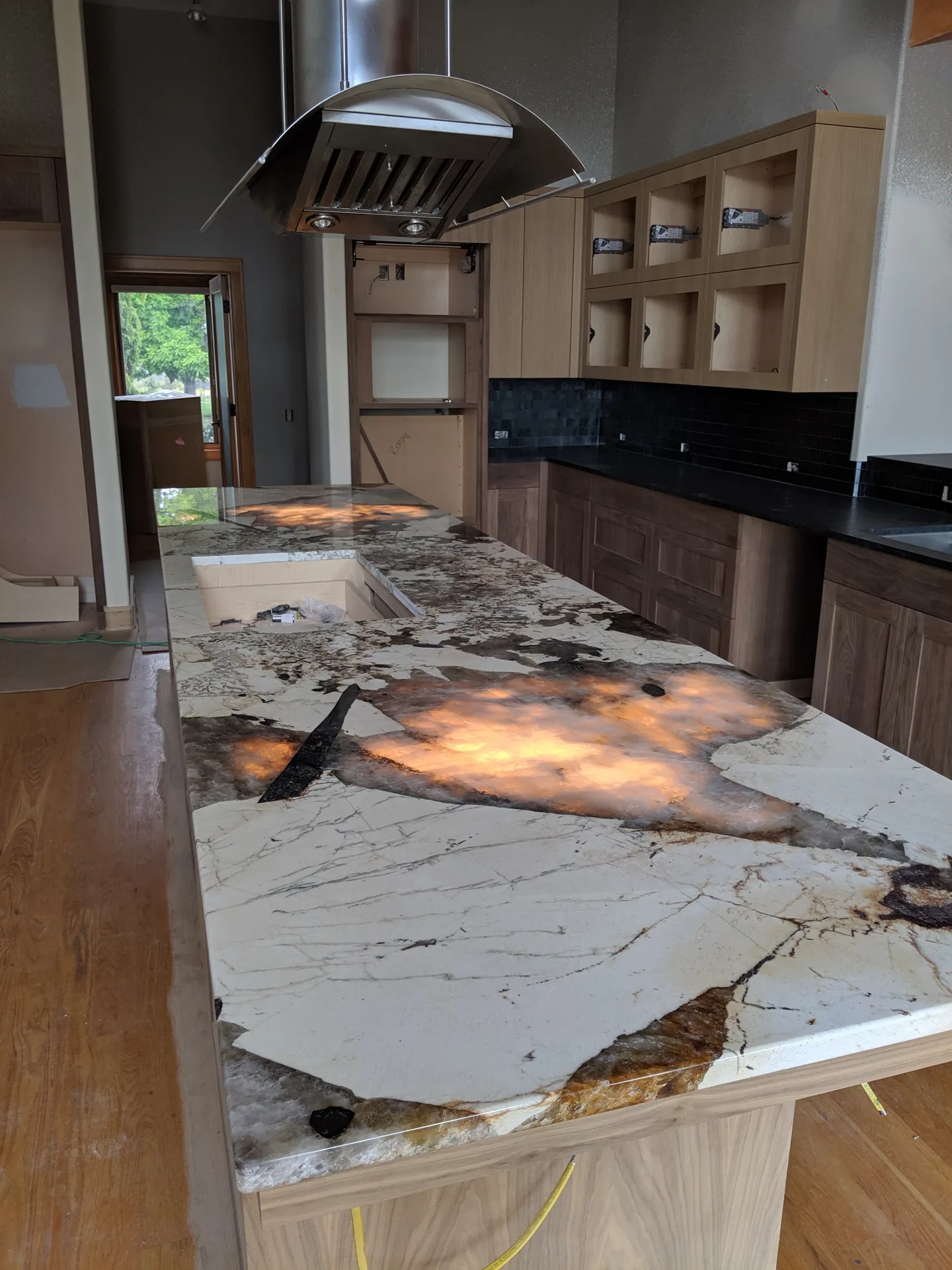 Exotic granite kitchen island with dramatic veining