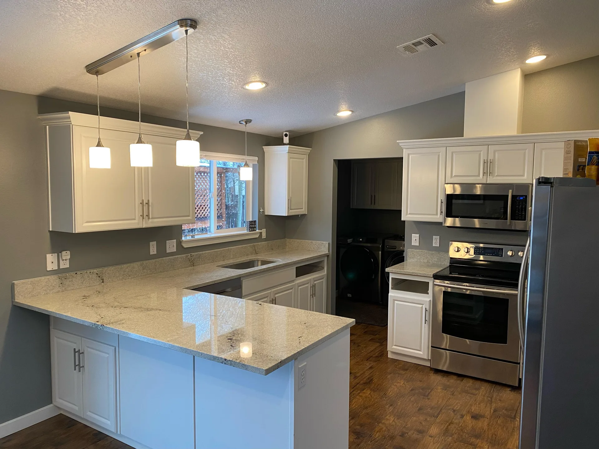 White granite kitchen peninsula